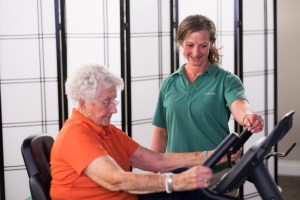 Jewel provides exercise instruction to client