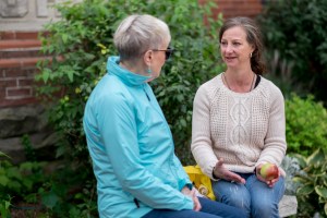 Jewel talking with her client